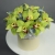 Композиция в шляпной коробке из 11 лаймовых орхидей в Люберцах